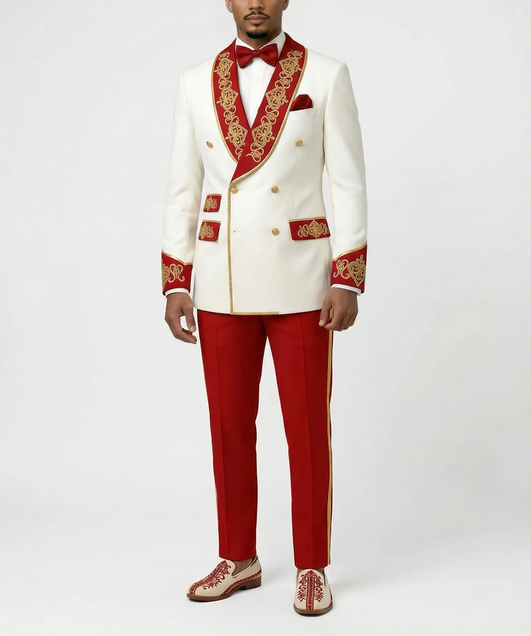 Man wearing a white suit with red accents and gold embroidery on a white background