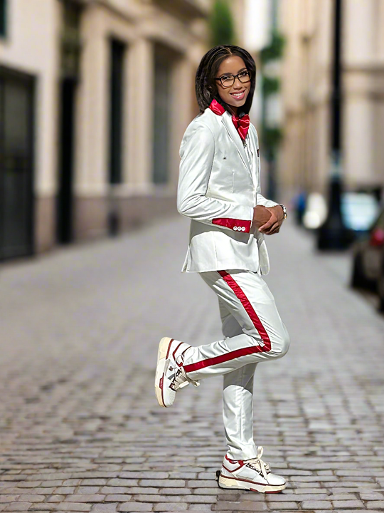 Woman wearing white suit with red stripe