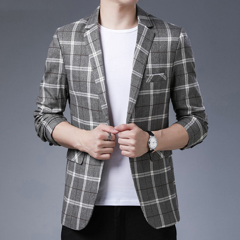 This sleek, stylish men's blazer is perfect for a more casual look. The cotton-blended fabric is comfortable and breathable, and the straight hem gives it a relaxed feel. It comes in khaki, gray, or blue, so you can choose the perfect color for your style.